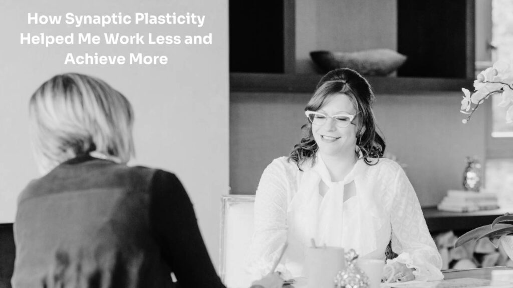 Laura Payne-Stanley talking to a client about synaptic plasticity