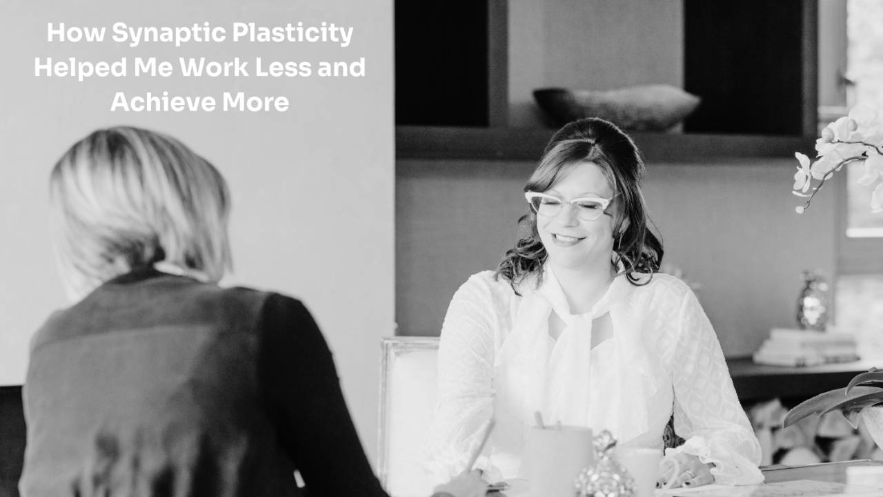 Laura Payne-Stanley talking to a client about synaptic plasticity