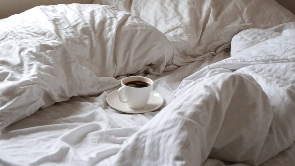 messy bed and cofe